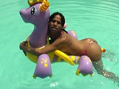 Black haired shemale strokes her pole